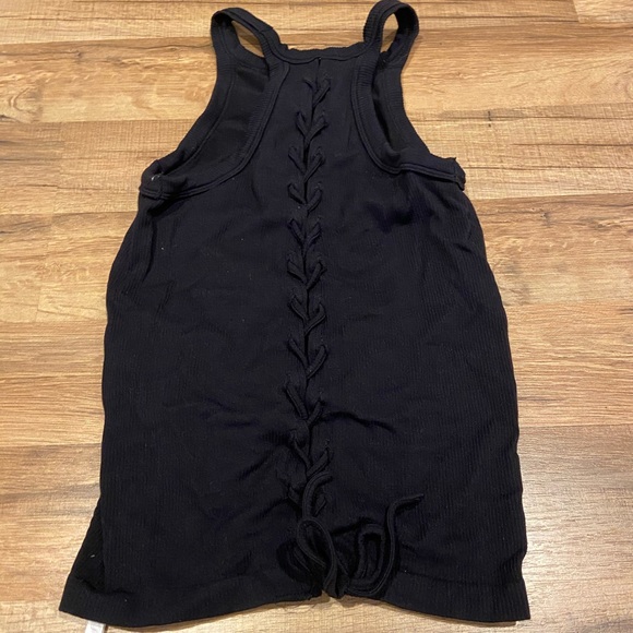 A black tank top. - Picture 1 of 2